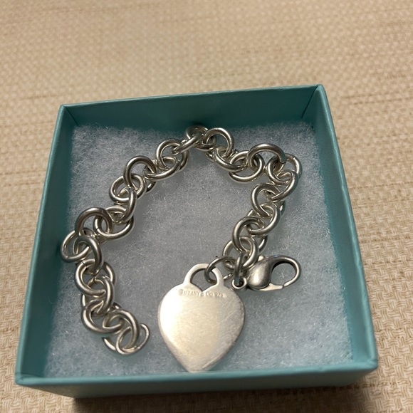 Tiffany & Co. heart charm link bracelet in 925 sterling...